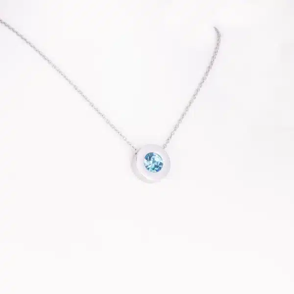 Magnetanhänger silberfarben mit einem aquablauen Zirkonia
